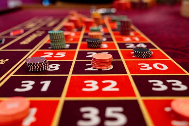 Live game show studio with host and real-time broadcast interface on naga777 login